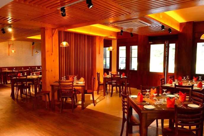 Imagen del bar/restaurante del Hotel GOOD WOOD AIRPORT HOTEL. Foto 2