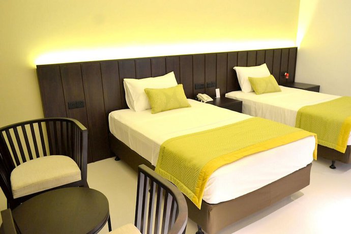 Imagen de la habitación del Hotel GOOD WOOD AIRPORT HOTEL. Foto 16