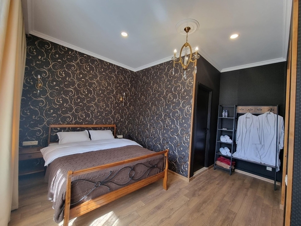 Imagen de la habitación del Hotel GRAF KAZBEGI. Foto 7