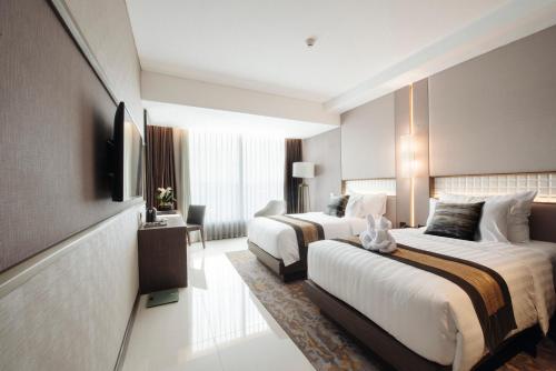 Imagen de la habitación del Hotel GRAMM by Ambarrukmo Yogyakarta. Foto 5
