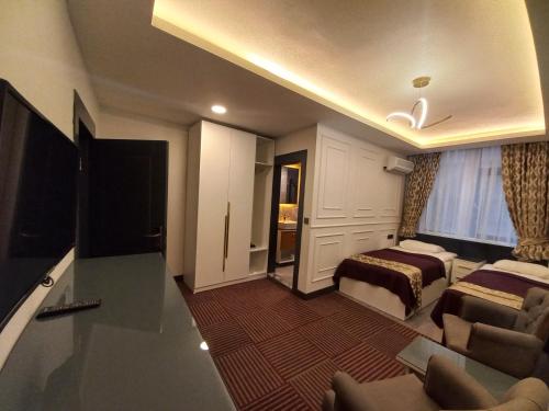 Imagen de la habitación del Hotel GRAND BELLİ OTEL. Foto 17