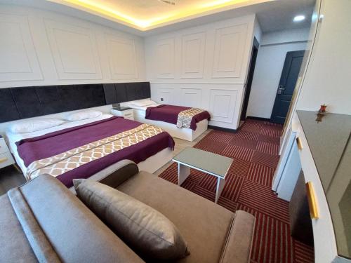 Imagen de la habitación del Hotel GRAND BELLİ OTEL. Foto 19