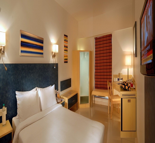 Imagen de la habitación del Hotel GRAND HOMETEL MALAD MUMBAI. Foto 4