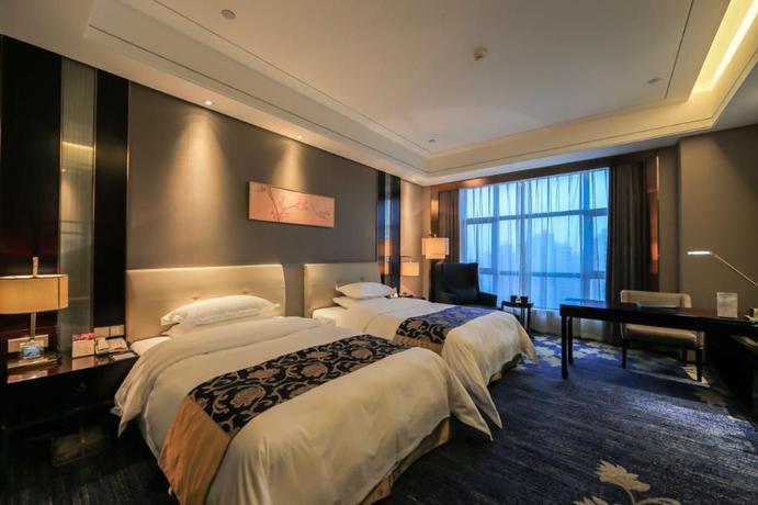 Imagen de la habitación del Hotel GRAND JIN OU INTERNATIONAL HOTEL. Foto 13