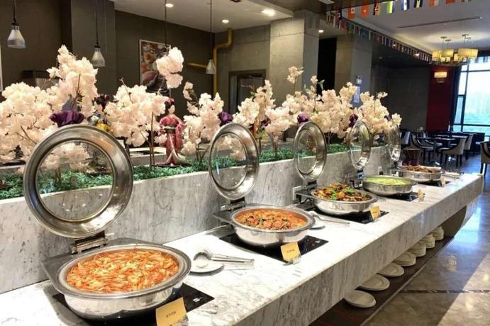 Imagen del bar/restaurante del Hotel GRAND JIN OU INTERNATIONAL HOTEL. Foto 5