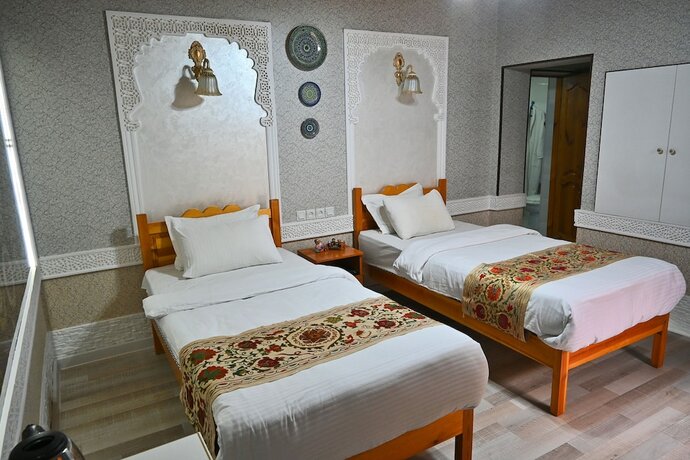 Imagen de la habitación del Hotel GRAND NODIRBEK. Foto 13