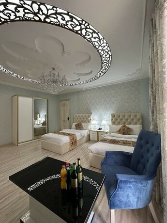 Imagen de la habitación del Hotel GRAND NODIRBEK. Foto 15