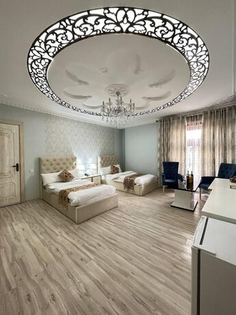 Imagen de la habitación del Hotel GRAND NODIRBEK. Foto 18