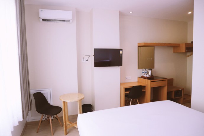 Imagen de la habitación del Hotel GRAND THAMRIN HOTEL. Foto 8