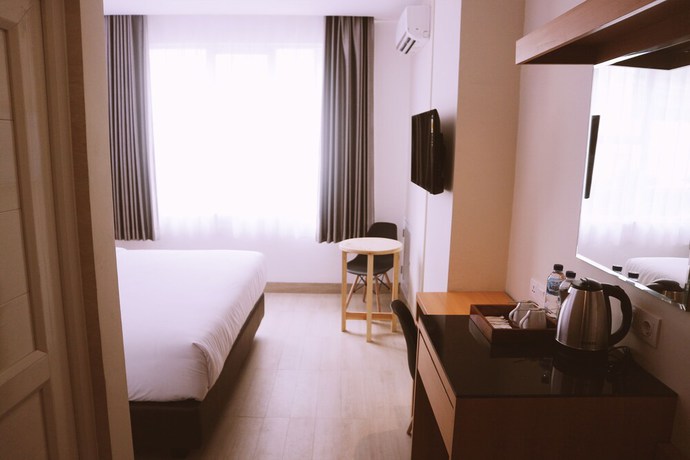 Imagen de la habitación del Hotel GRAND THAMRIN HOTEL. Foto 14