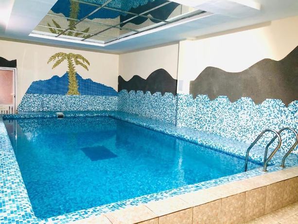 Imagen de la piscina del Hotel GRAND UZBEGIM. Foto 13