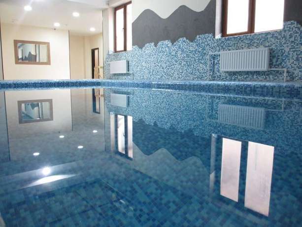Imagen de la piscina del Hotel GRAND UZBEGIM. Foto 14