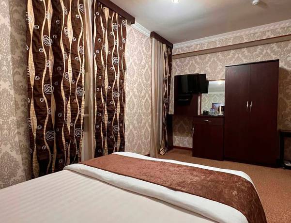 Imagen de la habitación del Hotel GRAND UZBEGIM. Foto 7