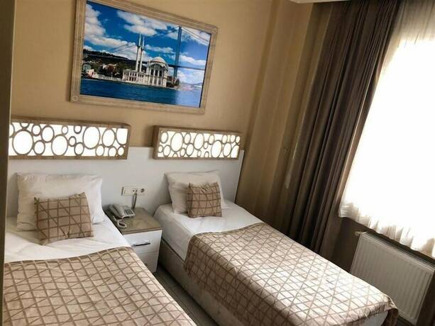 Imagen de la habitación del Hotel GRAND VATAN HOTEL. Foto 15