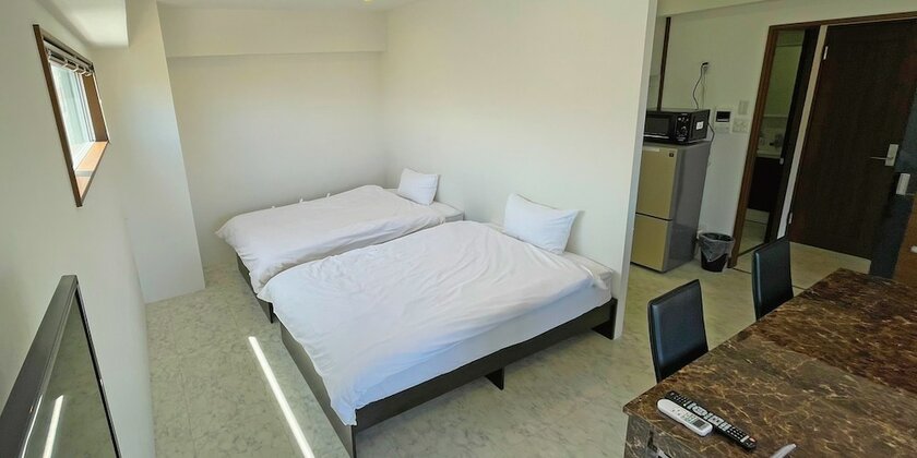Imagen de la habitación del Hotel G-RATIS Omoromachi. Foto 32