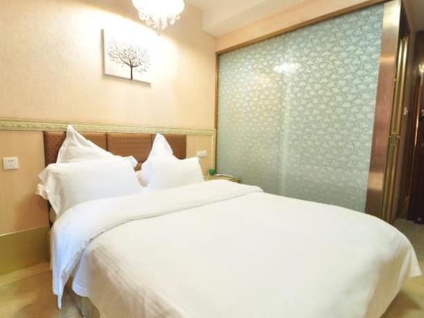 Imagen de la habitación del Hotel GREENTREE INN ANHUI LUAN RAILWAY STATION EAST BUS. Foto 1