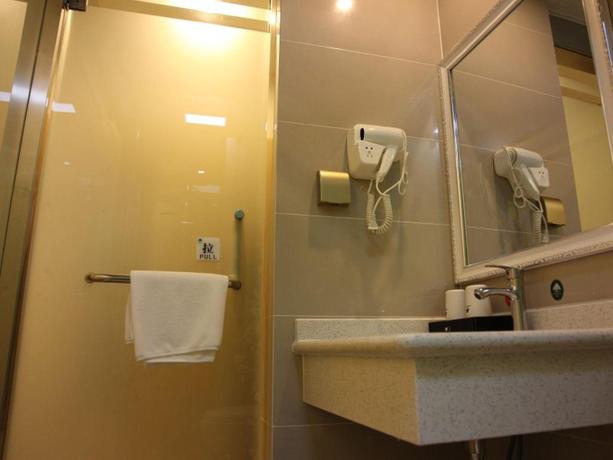 Imagen de la habitación del Hotel GREENTREE INN ZAOZHUANG HIGH SPEED TRAIN STATION E. Foto 4