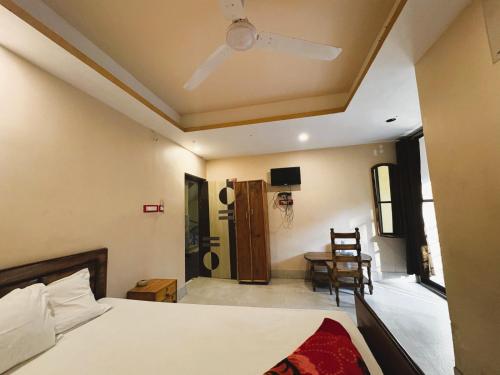 Imagen de la habitación del Hotel GRG Old Digha Near Sea Beach. Foto 19