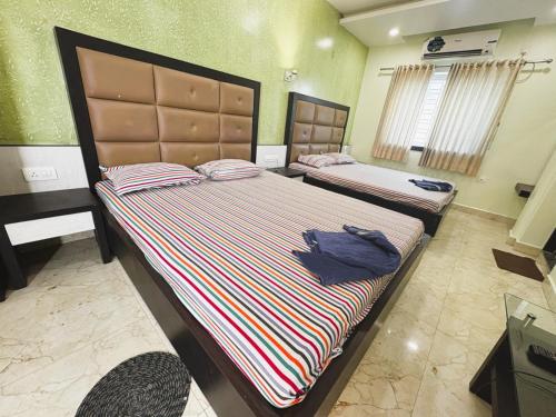 Imagen de la habitación del Hotel GRG P2 New Digha Full Air-conditioning Room. Foto 19