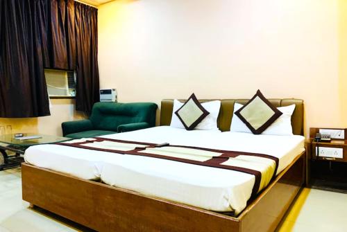 Imagen de la habitación del Hotel GRG R P International Patna. Foto 17