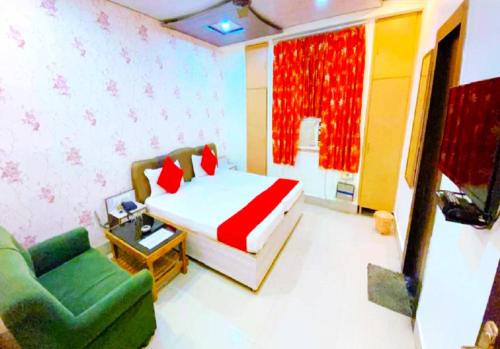 Imagen de la habitación del Hotel GRG R P International Patna. Foto 18