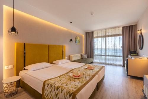 Imagen de la habitación del Hotel GRIFID Encanto Beach - MediSPA, Ultra All Inclusive & Private Beach. Foto 16
