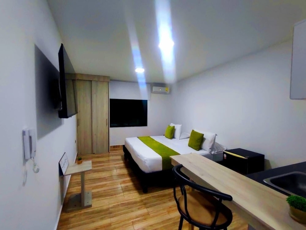 Imagen de la habitación del Hotel GS Granada Suites. Foto 4