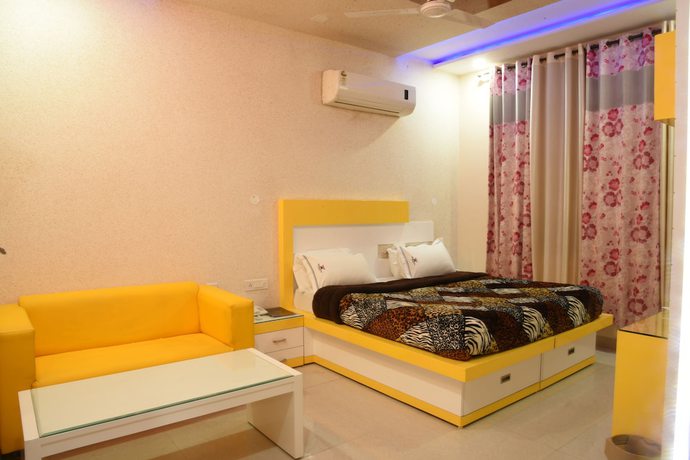 Imagen de la habitación del Hotel GST Grand Plaza. Foto 3