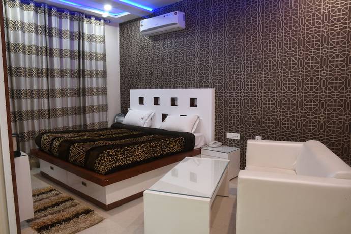 Imagen de la habitación del Hotel GST Grand Plaza. Foto 5