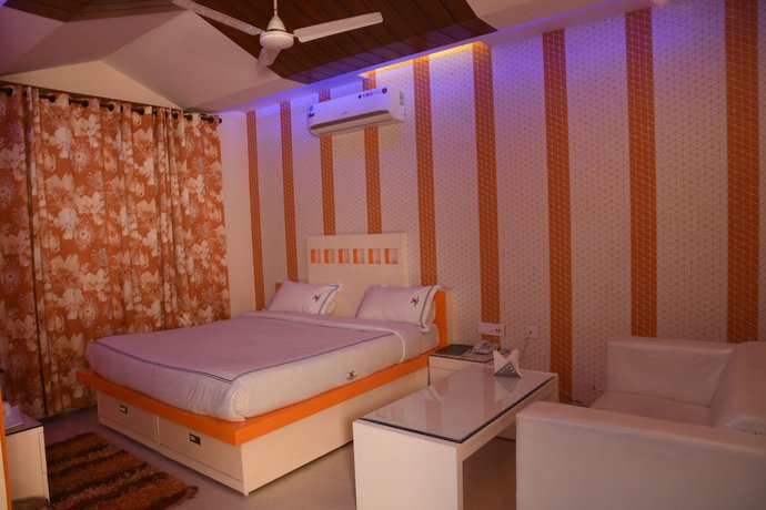 Imagen de la habitación del Hotel GST Grand Plaza. Foto 7