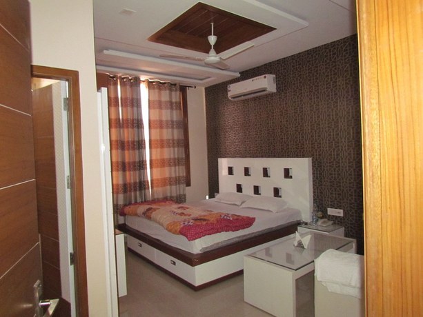 Imagen de la habitación del Hotel GST Grand Plaza. Foto 8