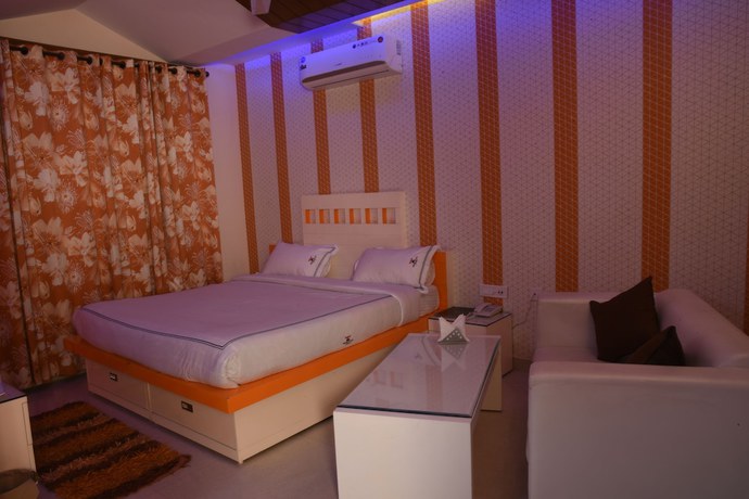Imagen de la habitación del Hotel GST Grand Plaza. Foto 10