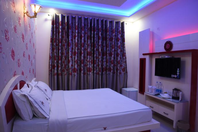 Imagen de la habitación del Hotel GST Grand Plaza. Foto 11