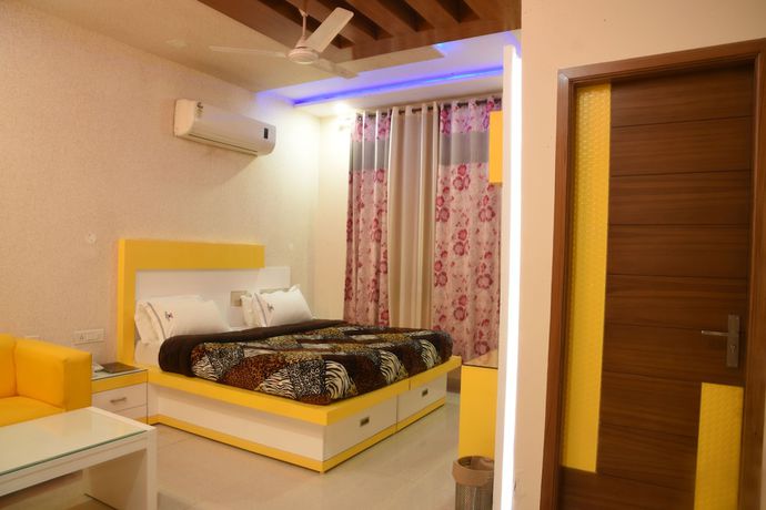 Imagen de la habitación del Hotel GST Grand Plaza. Foto 14