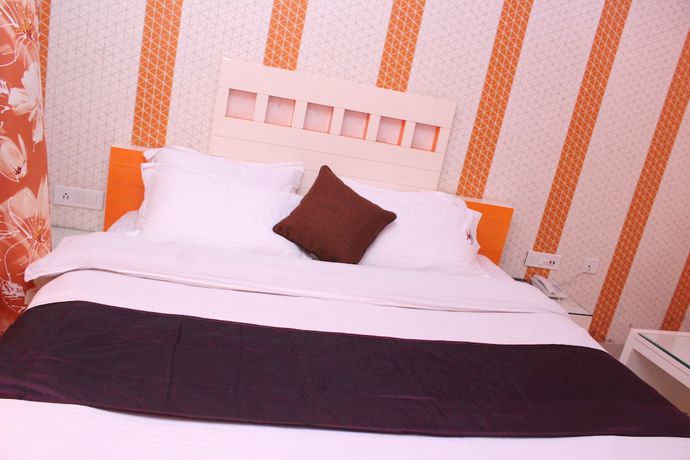 Imagen de la habitación del Hotel GST Grand Plaza. Foto 17