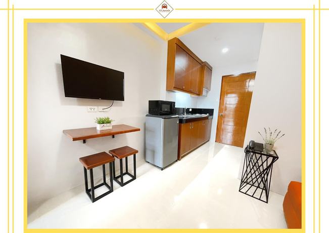 Imagen de la habitación del Hotel GTC Apartelle. Foto 3