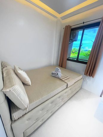 Imagen de la habitación del Hotel GTC Apartelle. Foto 8