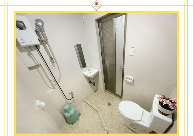 Imagen de la habitación del Hotel GTC Apartelle. Foto 11