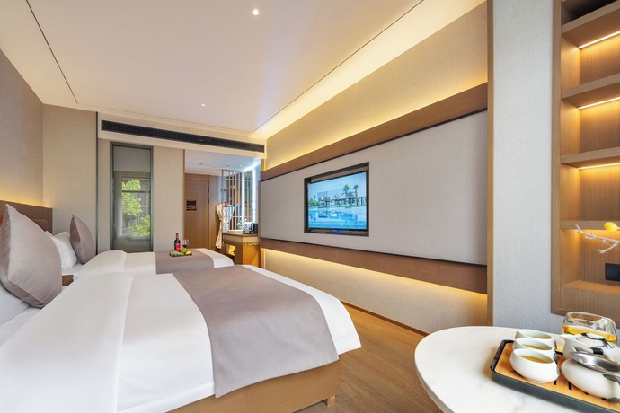 Imagen de la habitación del Hotel GUI YUAN ZHEN PIN HOTEL. Foto 9