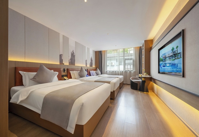 Imagen de la habitación del Hotel GUI YUAN ZHEN PIN HOTEL. Foto 10