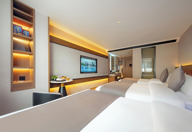 Imagen de la habitación del Hotel GUI YUAN ZHEN PIN HOTEL. Foto 11