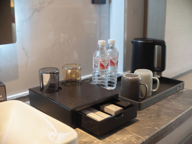 Imagen de la habitación del Hotel GUI YUAN ZHEN PIN HOTEL. Foto 14