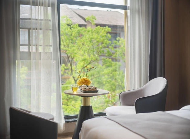 Imagen de la habitación del Hotel GUI YUAN ZHEN PIN HOTEL. Foto 15