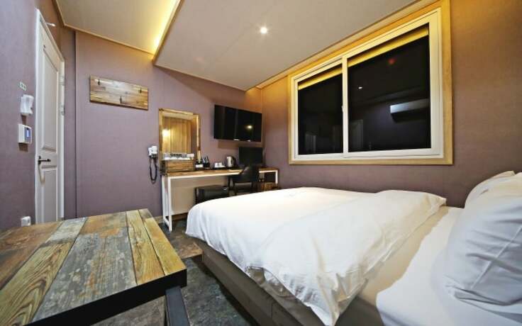 Imagen de la habitación del Hotel GUKMIN. Foto 12