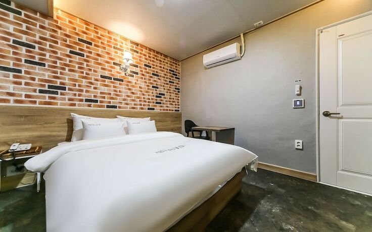 Imagen de la habitación del Hotel GUKMIN. Foto 13