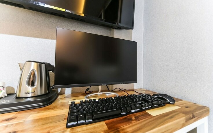 Imagen de la habitación del Hotel GUKMIN. Foto 16