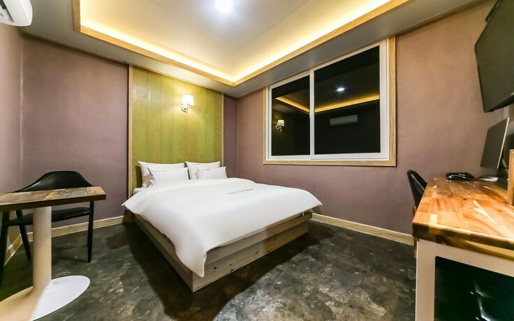 Imagen de la habitación del Hotel GUKMIN. Foto 17