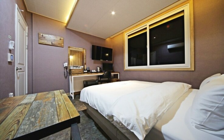 Imagen de la habitación del Hotel GUKMIN. Foto 20
