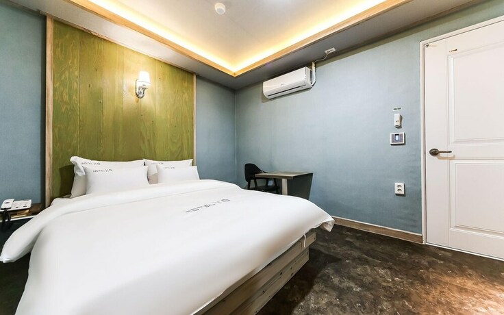 Imagen de la habitación del Hotel GUKMIN. Foto 22