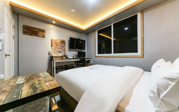 Imagen de la habitación del Hotel GUKMIN. Foto 25